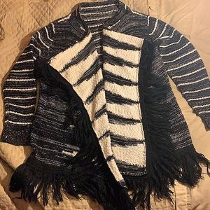 B.NYGARD SZ M B&W UNIQUE LONG SWEATER WITH FRINGES ATTHE BOTTOM.